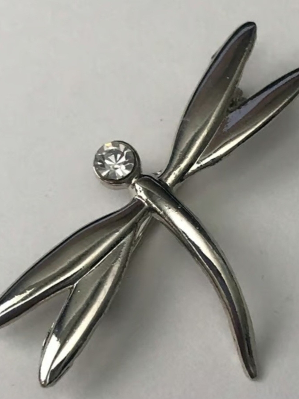 Elegant Silver Dragonfly Brooch with Clear Rhinestone Accent